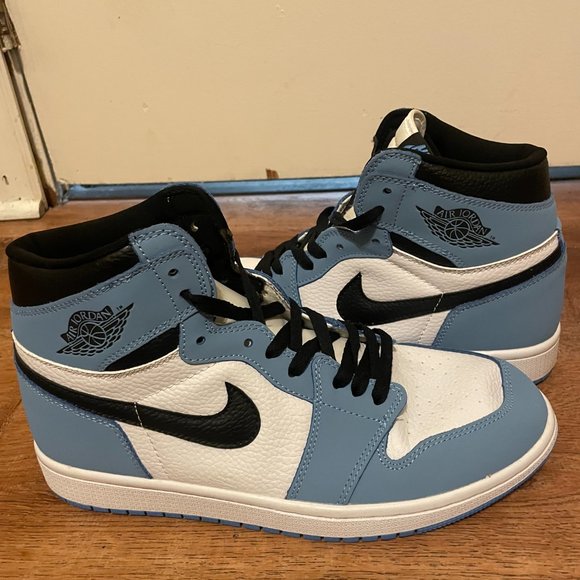 Nike Air Jordan Retro 1 High OG in White/Black/University Blue. main image 6